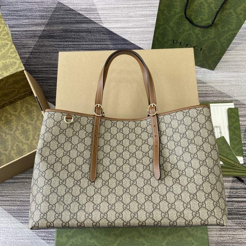 G*u*i shopping bags